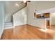 Living room with hardwood floors and staircase at 12189 Armenia Gables Cir # 12189, Tampa, FL 33612