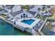 Community pool with deck and lounge chairs at 12189 Armenia Gables Cir # 12189, Tampa, FL 33612