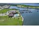 Community clubhouse with a pool overlooking the marina and waterfront homes at the end of a cul-de-sac at 1902 4Th E St, Palmetto, FL 34221