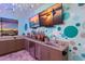 Stylish bar area with waterfront views, custom lighting, and modern design at 1902 4Th E St, Palmetto, FL 34221