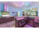 Entertainers dream bar area includes a fully stocked bar and open access to the outdoor living spaces at 1902 4Th E St, Palmetto, FL 34221
