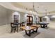 Beautiful game room featuring a pool table and a ping pong table at 1902 4Th E St, Palmetto, FL 34221