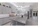 Well-appointed kitchen with an island, stainless steel appliances, and modern lighting fixtures at 1902 4Th E St, Palmetto, FL 34221