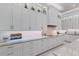 Gourmet kitchen with sleek countertops, stylish backsplash, and stainless steel appliances at 1902 4Th E St, Palmetto, FL 34221