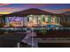 The waterfront property boasts a covered lanai with outdoor bar, seating, and access to a private pool and boat dock at 1902 4Th E St, Palmetto, FL 34221