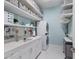 Well-appointed laundry room with modern appliances and ample storage space at 1902 4Th E St, Palmetto, FL 34221