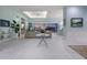 Spacious living room with marble floors, modern decor, and a stunning water view at 1902 4Th E St, Palmetto, FL 34221