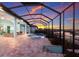 Relax in your backyard oasis with a pool and spa, set against a picturesque waterfront backdrop at 1902 4Th E St, Palmetto, FL 34221