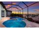 This pool and spa offer a great place to unwind and enjoy the stunning views of the waterfront at 1902 4Th E St, Palmetto, FL 34221