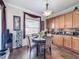 Breakfast nook with four chairs and a window overlooking the backyard at 19029 Chislehurst Dr, Land O Lakes, FL 34638