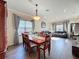 Formal dining room with a wood table and six chairs at 19029 Chislehurst Dr, Land O Lakes, FL 34638
