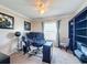 Functional home office with a desk, chair, and built-in shelving at 19029 Chislehurst Dr, Land O Lakes, FL 34638
