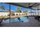 Stunning pool and patio with covered lanai and lush landscaping at 19029 Chislehurst Dr, Land O Lakes, FL 34638