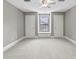 Bright bedroom featuring a window seat and built-in storage at 1903 Haven Bend, Tampa, FL 33613