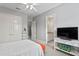 Bedroom with ensuite bathroom and built-in shelving at 1903 Haven Bend, Tampa, FL 33613