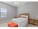 Cozy bedroom with a comfortable bed and plenty of natural light at 1903 Haven Bend, Tampa, FL 33613