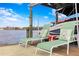 Comfortable lounge chairs on a peaceful dock overlooking the lake at 1903 Haven Bend, Tampa, FL 33613