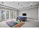 Game room with lake view, foosball table, and exercise equipment at 1903 Haven Bend, Tampa, FL 33613
