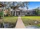 Stunning lakefront home with a large screened patio at 1903 Haven Bend, Tampa, FL 33613