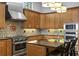 Well-equipped kitchen with stainless steel appliances and granite countertops at 1903 Haven Bend, Tampa, FL 33613