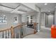 Open upper hallway with built-in shelving and water views at 1903 Haven Bend, Tampa, FL 33613