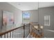 Spacious upper hallway with a chandelier, and views to the lower level at 1903 Haven Bend, Tampa, FL 33613