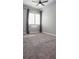 Spacious bedroom with carpet flooring and window with shutters at 200 4Th S Ave # 139, St Petersburg, FL 33701
