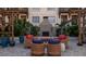 Community courtyard with fireplace, seating area, and lush landscaping at 200 4Th S Ave # 139, St Petersburg, FL 33701