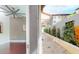 View of courtyard with brick pathway, landscaping, and building exterior at 200 4Th S Ave # 139, St Petersburg, FL 33701