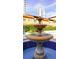 Ornate fountain in community area with blue tile and tropical landscaping at 200 4Th S Ave # 139, St Petersburg, FL 33701
