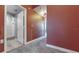 Hallway with carpet flooring and access to a bathroom at 200 4Th S Ave # 139, St Petersburg, FL 33701
