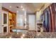 Modern kitchen with granite countertops and stainless steel appliances at 200 4Th S Ave # 139, St Petersburg, FL 33701
