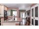 Modern kitchen with granite countertops, stainless steel appliances, and hardwood floors at 200 4Th S Ave # 139, St Petersburg, FL 33701