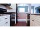 Modern kitchen with granite countertops, stainless steel appliances, and a breakfast bar at 200 4Th S Ave # 139, St Petersburg, FL 33701