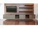 Living area with modern built-in entertainment center at 200 4Th S Ave # 139, St Petersburg, FL 33701