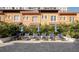 Pool area with lounge chairs, umbrellas, and surrounding tropical plants at 200 4Th S Ave # 139, St Petersburg, FL 33701