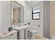 Modern bathroom with a stand up shower, toilet, and a stylish vanity at 2109 Bayshore Blvd # 704, Tampa, FL 33606