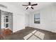 Well-lit bedroom with a ceiling fan, closet, and a window, offering ample space and natural light at 2109 Bayshore Blvd # 704, Tampa, FL 33606