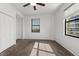 Comfortable bedroom with a ceiling fan, closet, and a window, offering ample space and natural light at 2109 Bayshore Blvd # 704, Tampa, FL 33606
