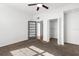 Spacious bedroom with a ceiling fan, closet, and a stylish glass door at 2109 Bayshore Blvd # 704, Tampa, FL 33606