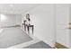 Hallway with neutral decor, gray carpet and lovely table decor at 2109 Bayshore Blvd # 704, Tampa, FL 33606