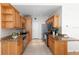 Bright galley kitchen features stainless steel appliances, tile flooring, and granite countertops at 2109 Bayshore Blvd # 704, Tampa, FL 33606