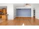 Living room showing hardwood floors, modern color palate, and adjacent kitchen area at 2109 Bayshore Blvd # 704, Tampa, FL 33606