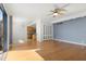 Bright living room features a ceiling fan, hardwood floors and large windows at 2109 Bayshore Blvd # 704, Tampa, FL 33606