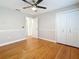 Light and airy bedroom with hardwood floors and double closets at 2446 Belleair Rd, Clearwater, FL 33764
