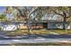 Ranch home with mature landscaping and long driveway at 2446 Belleair Rd, Clearwater, FL 33764