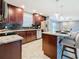 Modern kitchen with granite countertops, stainless steel appliances, and ample cabinetry at 2446 Belleair Rd, Clearwater, FL 33764
