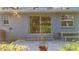 Private patio with sliding glass doors and brick flooring at 2446 Belleair Rd, Clearwater, FL 33764
