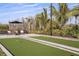 Well-maintained bocce ball court with seating area at 29555 Zupetta Ln, Wesley Chapel, FL 33545