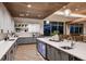 Modern community kitchen featuring a large island and breakfast bar at 29555 Zupetta Ln, Wesley Chapel, FL 33545
